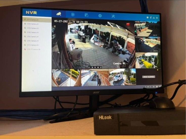CCTV security camera system monitoring screen and NVR setup installed in Sydney – Ampera Electrical
